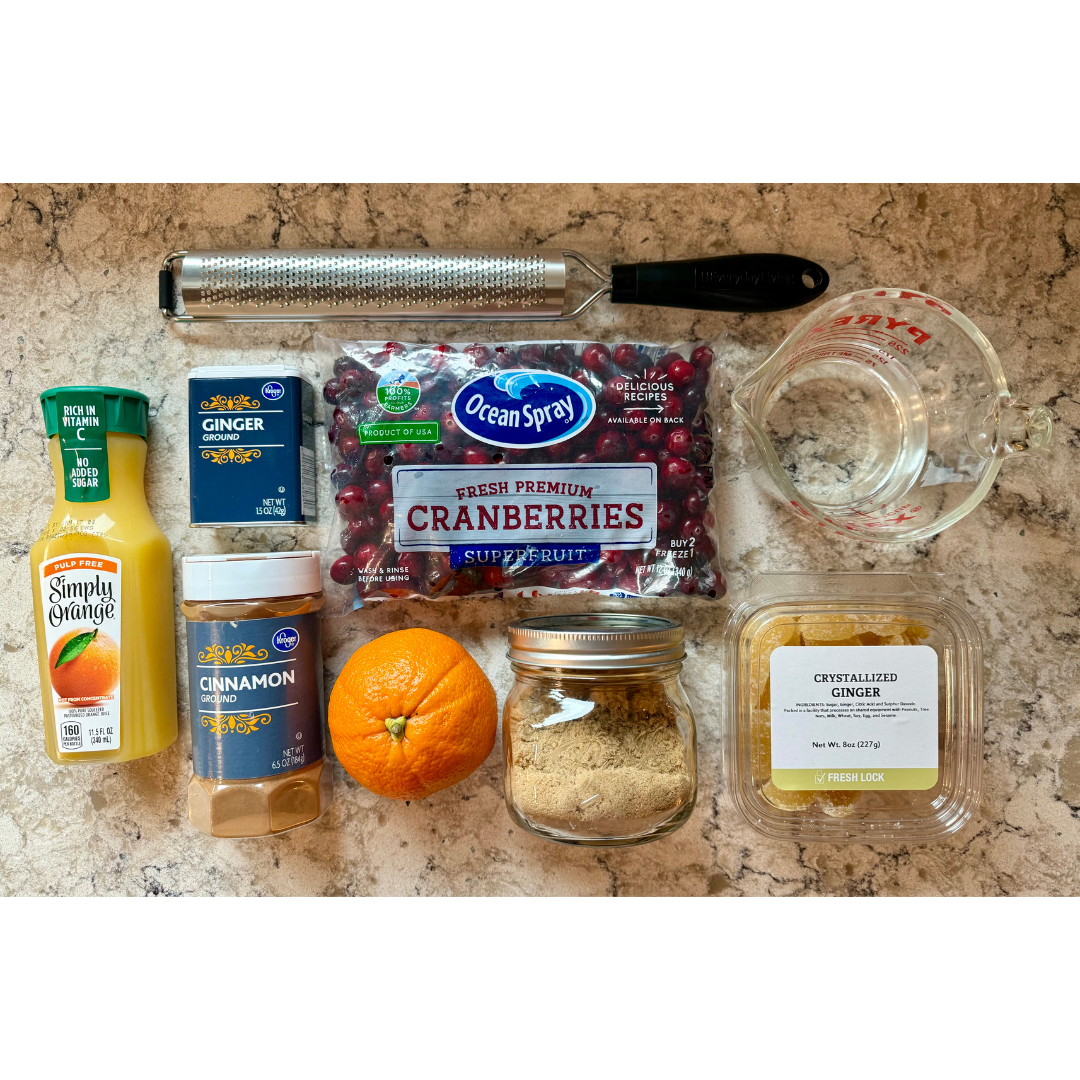 Ingredients for best ever cranberry sauce recipe (microplane fine grater/zester, orange juice, ground ginger, cranberries, water, orange, cinnamon, brown sugar, and crystalized ginger).