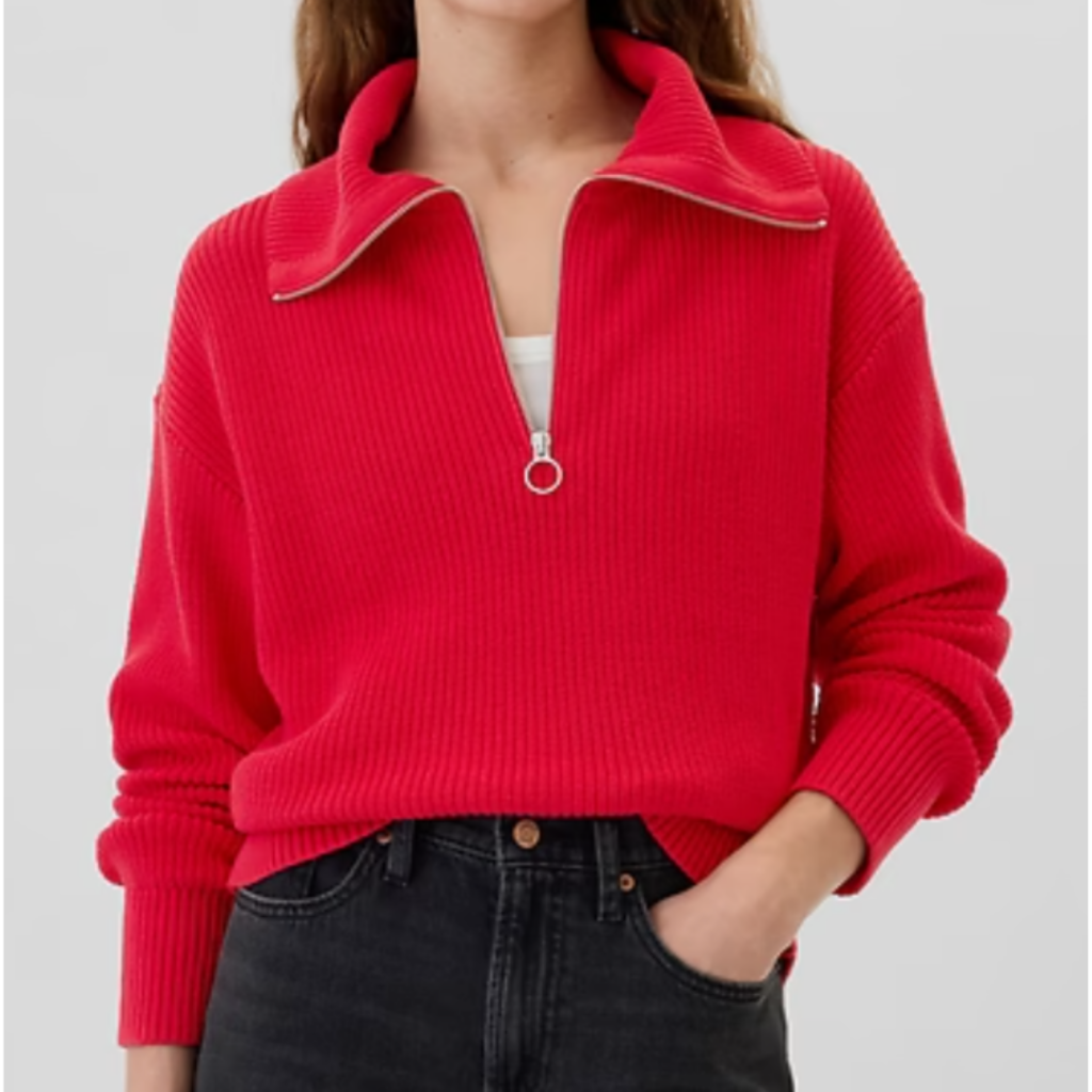 Woman wearing red quarter zip sweater. Link included for purchase.