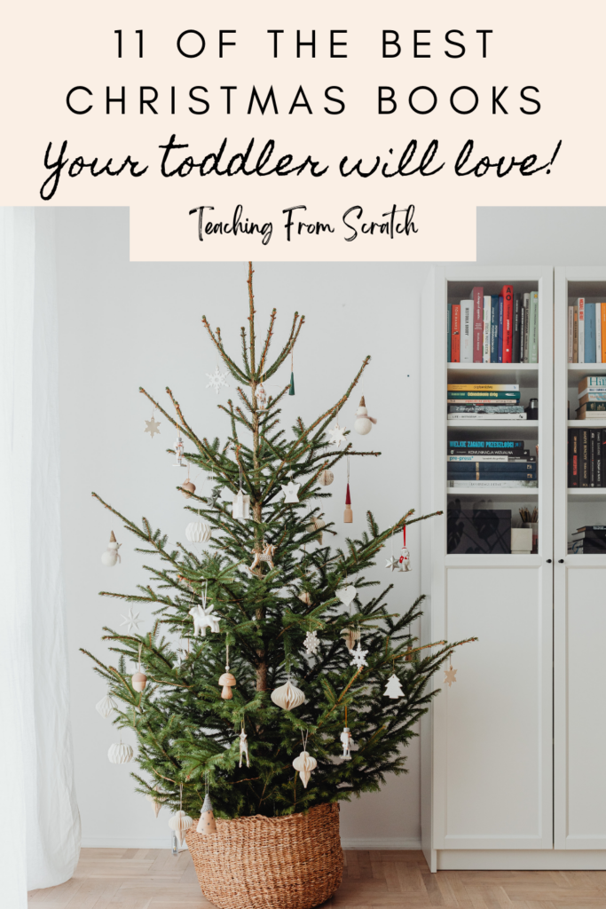 Image of pin that says "11 of the best Christmas books your toddler will love" text over image of Christmas tree next to bookshelf with books. 