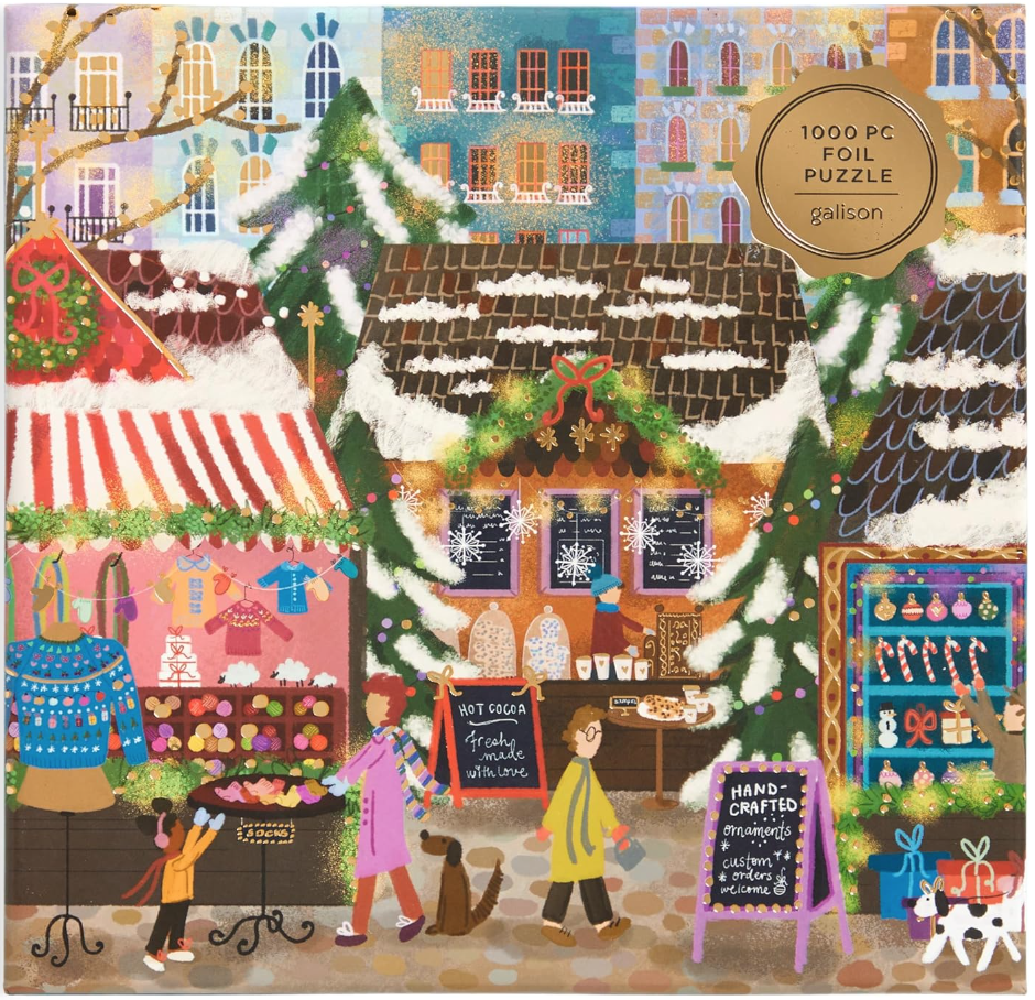 Image of a puzzle of a winter scene in a town square. There are buildings, shops filled with items such as sweaters and goodies and candies, and people walking by with their dogs.