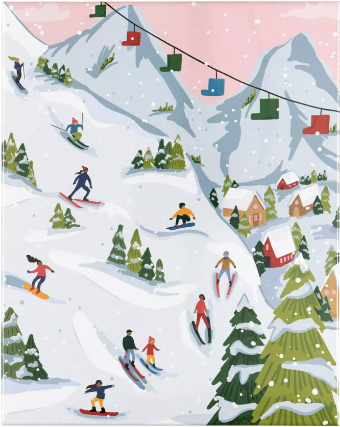 Picture of 500 piece winter puzzle with skiers and snowboarders going down a mountain with trees in the snow. Link for purchase provided below. 