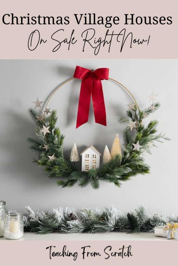 Pinnable image that says "Christmas Village Houses On Sale Right Now!" and has image Christmas village house in gold ring with garland and a red velvet bow. Garland and candles are below.