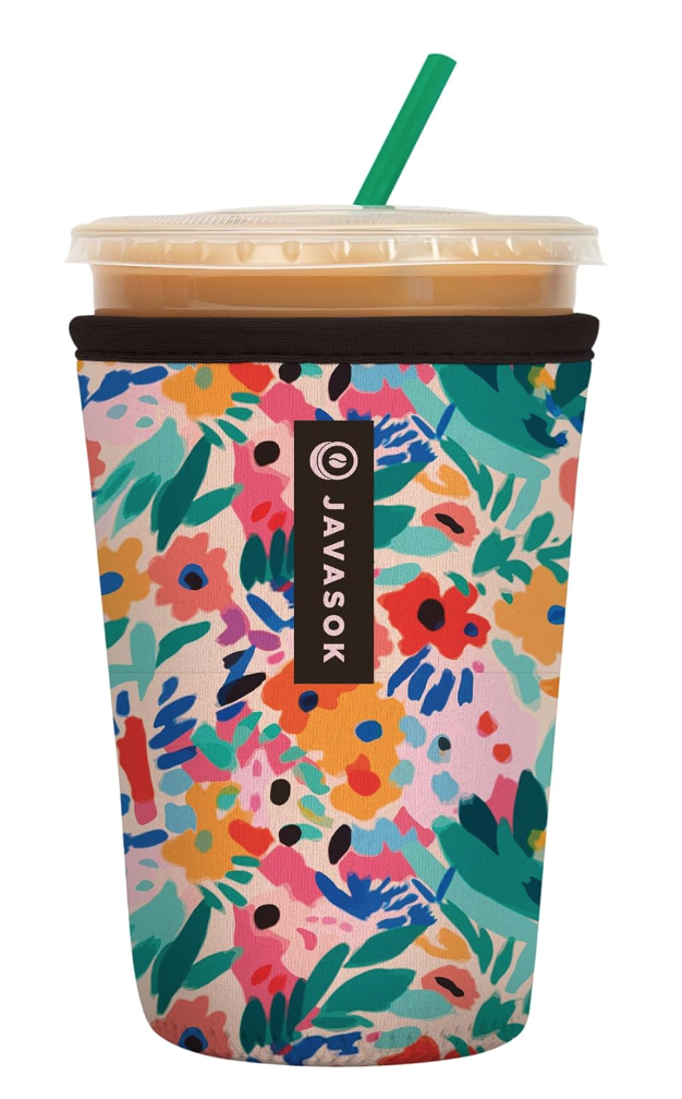 Image of neoprene cup holder in floral pattern with iced coffee inside.