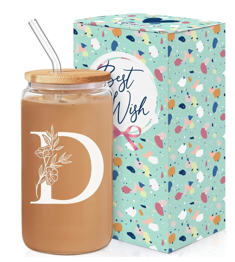 Image of glass jar with monogrammed "D" with bamboo lid and straw next to box with confetti.