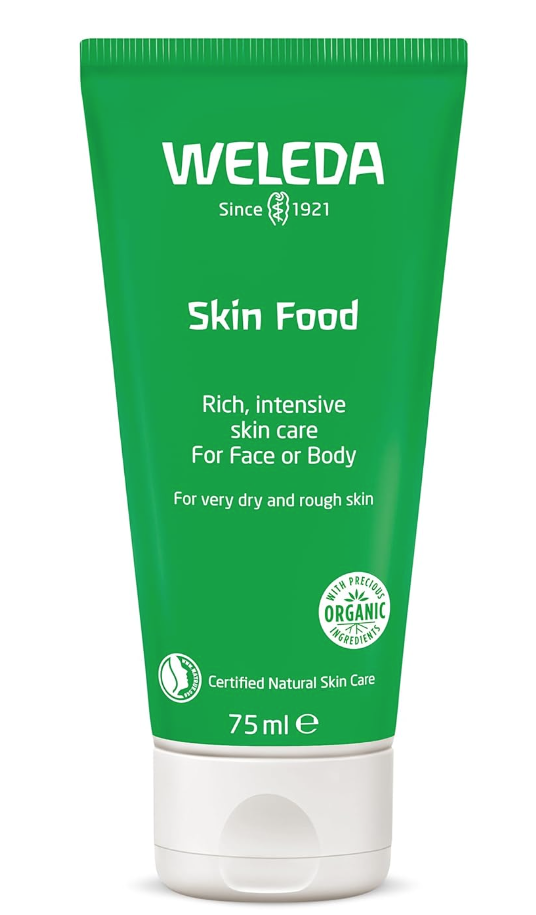 Image of green bottle of weleda skin food lotion with white cap. 