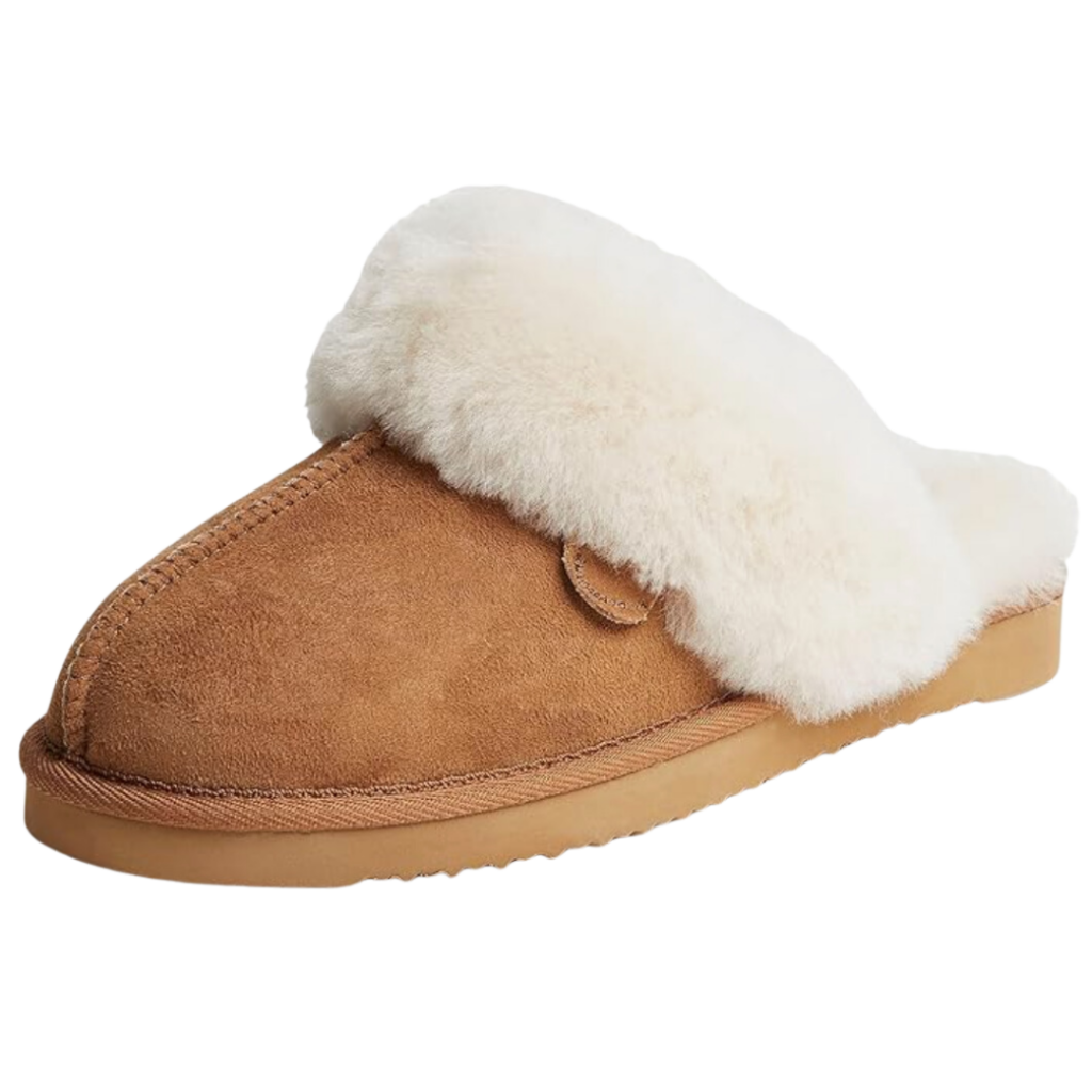 household essentials aesthetic. Image of chestnut colored slippers with sheepskin fur, and rubber sole. 