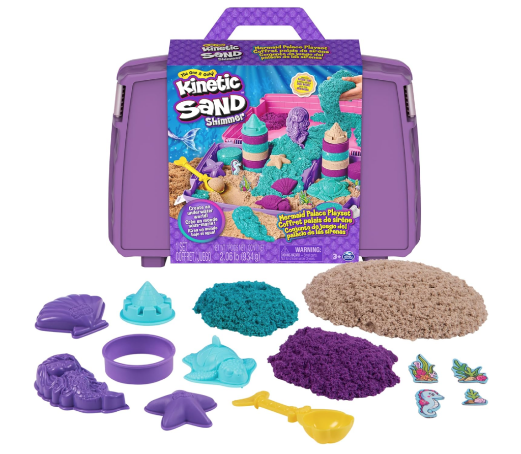 best toddler toys for 2-year-olds. Image of kinetic sand in purple case and objects in front. 