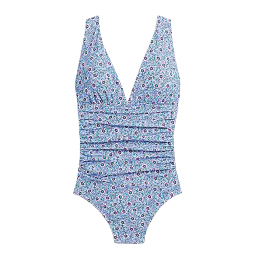 Cute one piece swimsuits for women. Ruched plunge neck swimsuit in powder blue with flower pattern. 