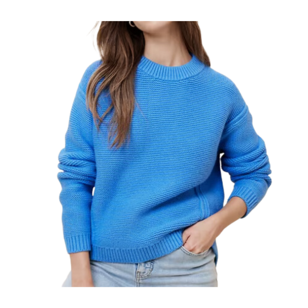 kindergarden teacher outfits. Image of woman in bright blue sweater. 