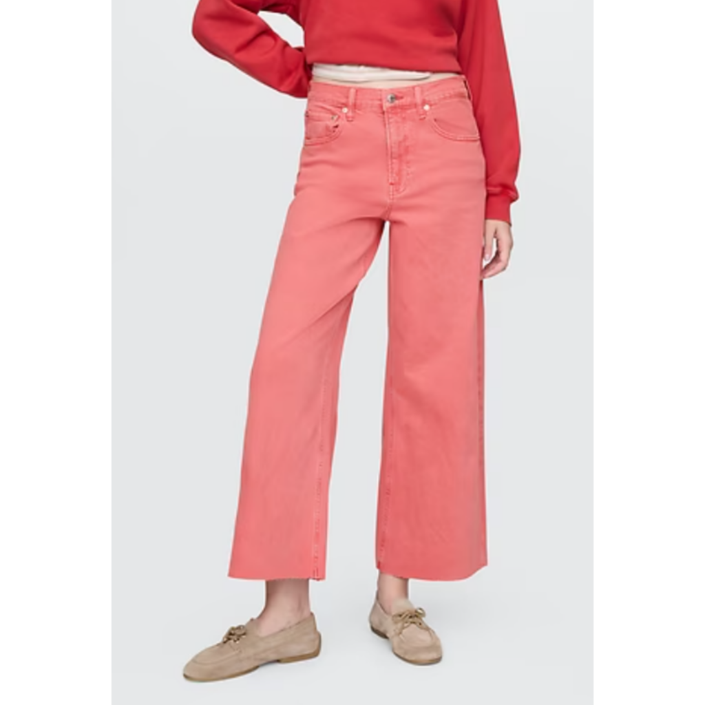 kindergarten teacher outfit ideas. Woman in pink cropped wide leg pants with pink sweater. 