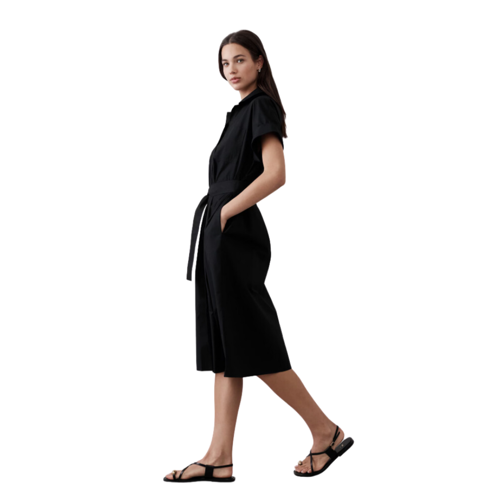 teacher dresses for work. Woman in black linen midi dress in black sandald.